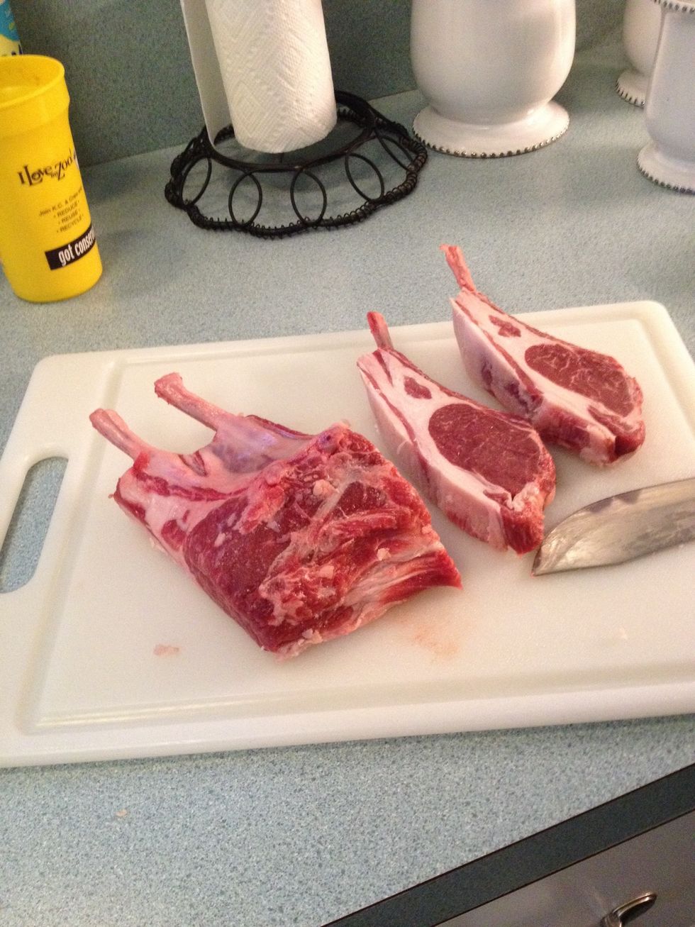 Cut between each bone to separate the individual Lamb Chops.