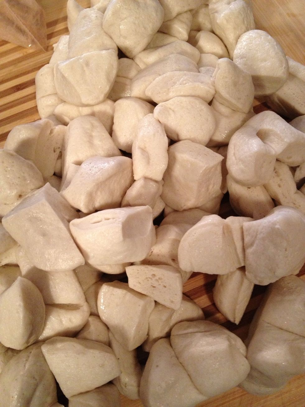 Cut biscuits into quarters