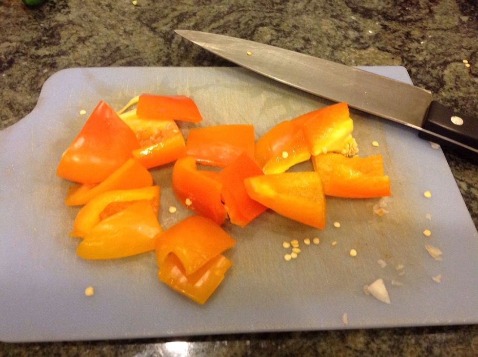 Cut both bell peppers into small enough pieces so they can be minced.
