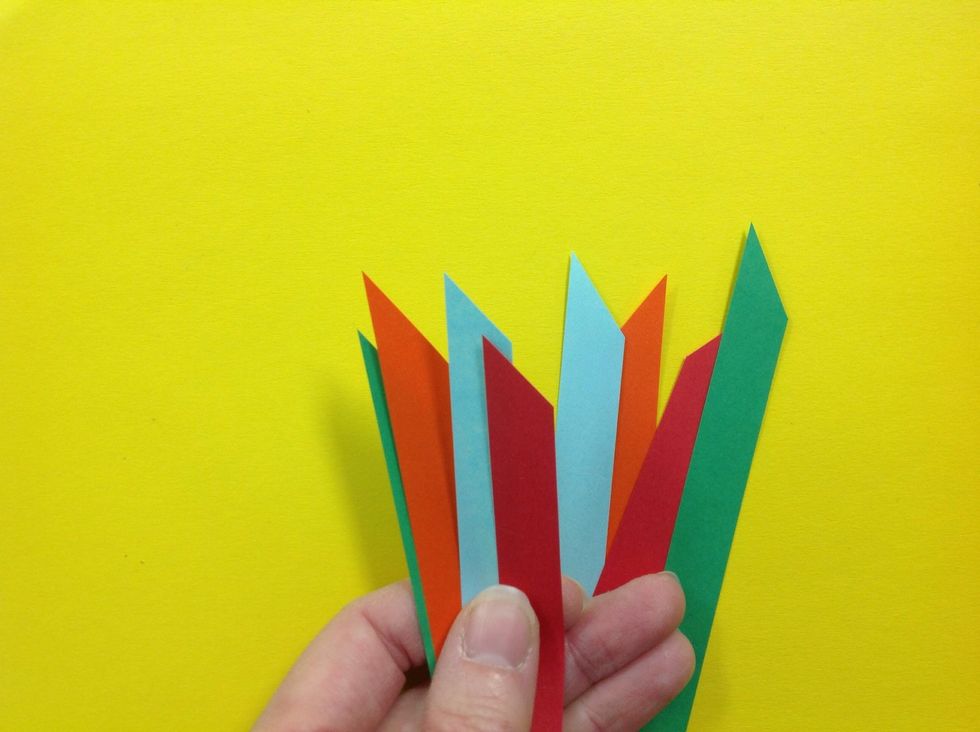 Cut both ends of each strip in a diagonal.