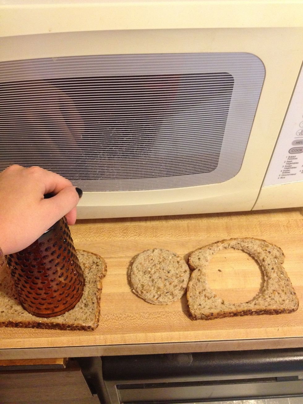 Cut bread with cup like so, you may have to push hard and twist. SAVE THE CIRCLES!!!