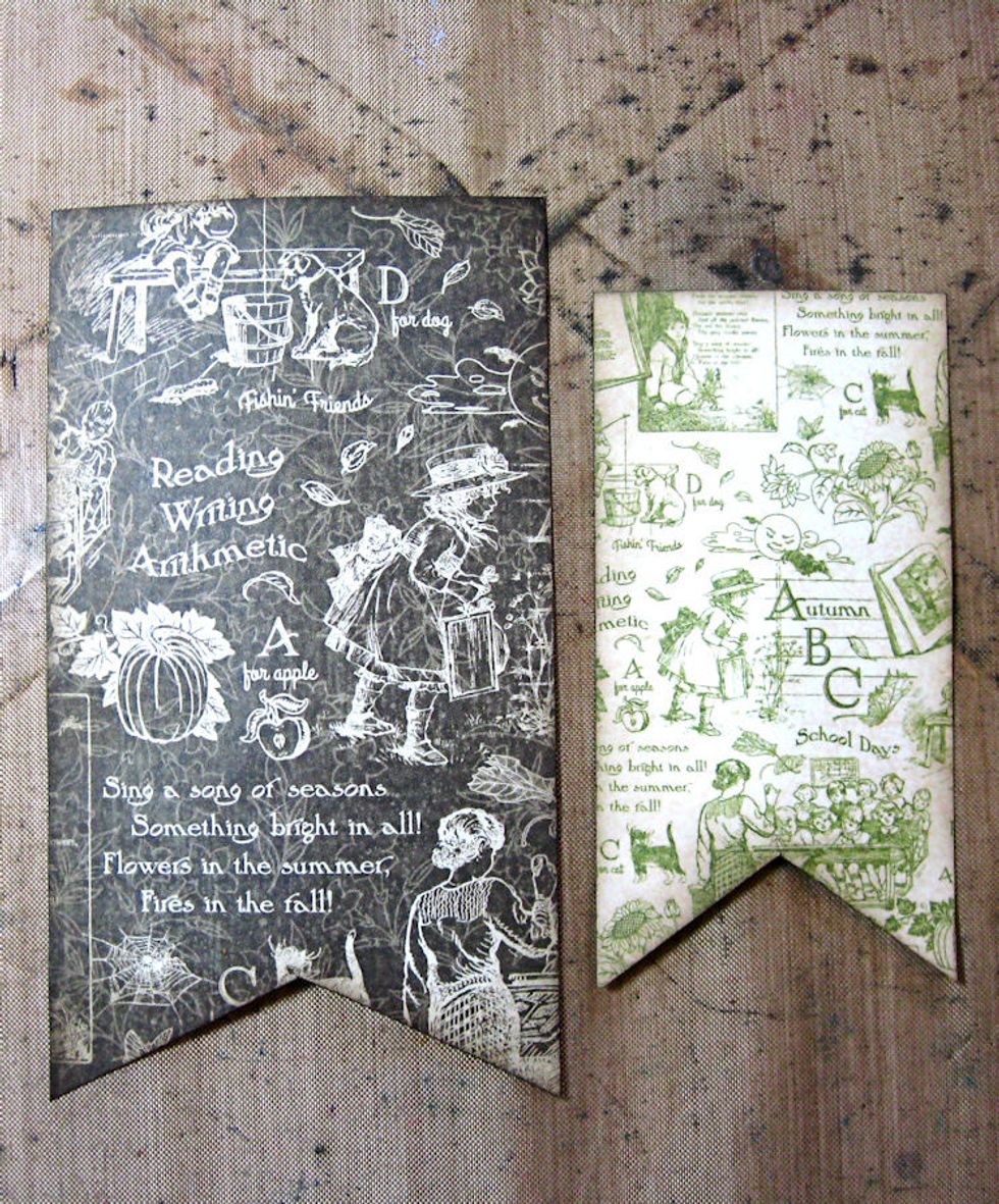 Cut brown banner to measure 3" x 5.5". To create fishtail, fold in half and cut at 45 degree angle. Cut green banner to measure 2.25x 4.25. Ink all cut edges with Walnut Stain Distress Ink.