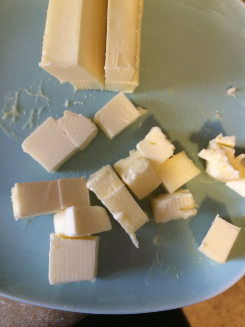 Cut butter into cubes
