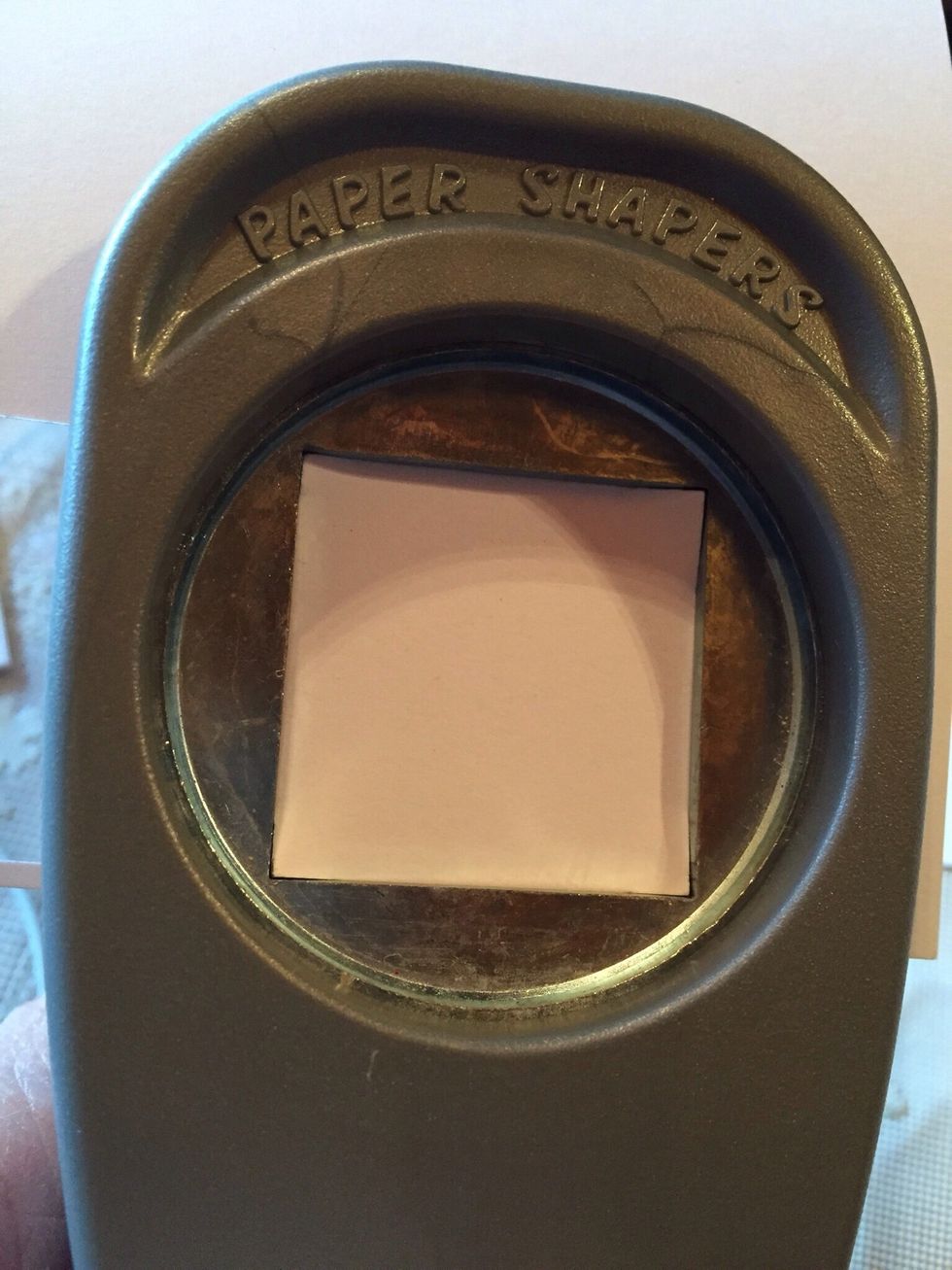 Cut card-stock into one inch squares. A punch is helpful for this. Chose card-stock color according to graduates cap and gown colors.