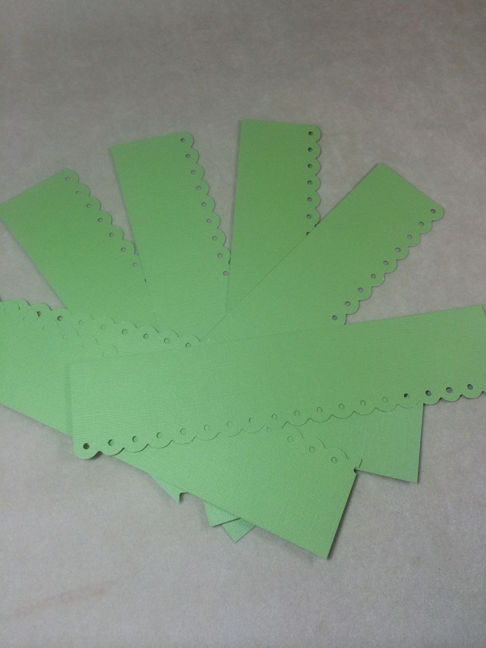 Cut card stock strips 2" x 7" then use your favorite border punch along one long edge.