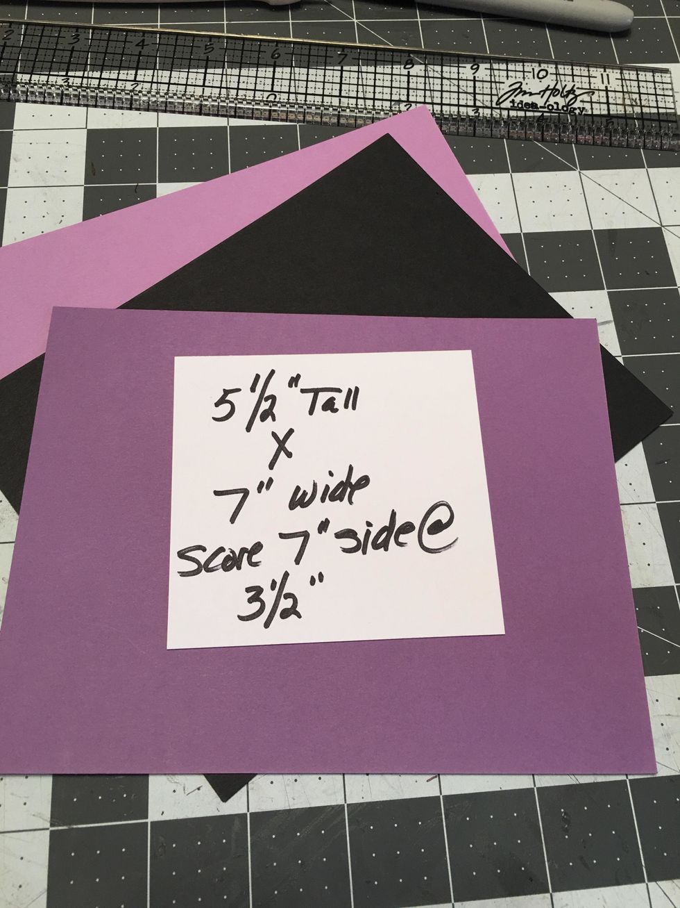 Cut cardstock in black and purples to 5.50" tall x 7" wide.  Score the 7" side at 3.50" to fold the paper in half to make page signatures.