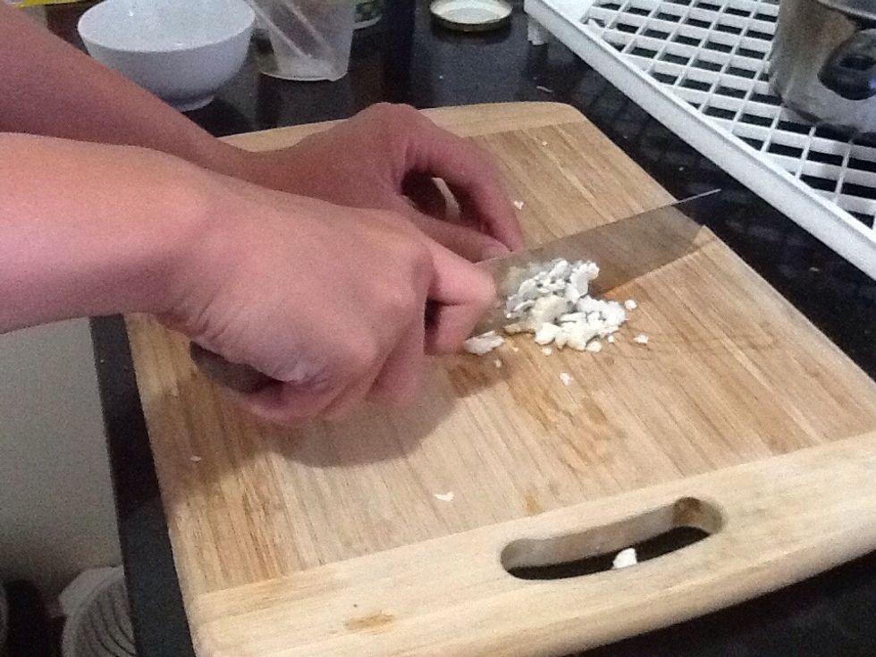 Cut cauliflower into little pieces so it is almost a mash.