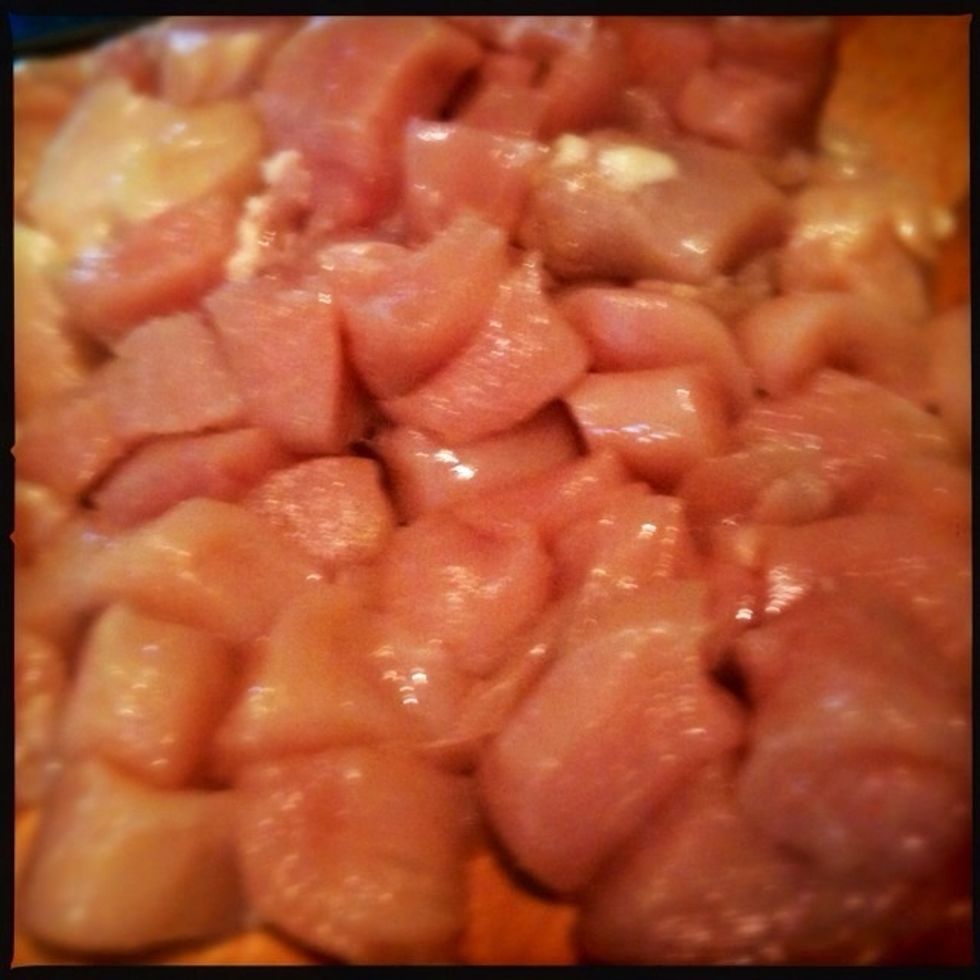 Cut chicken breast into thin slices or small cubes.