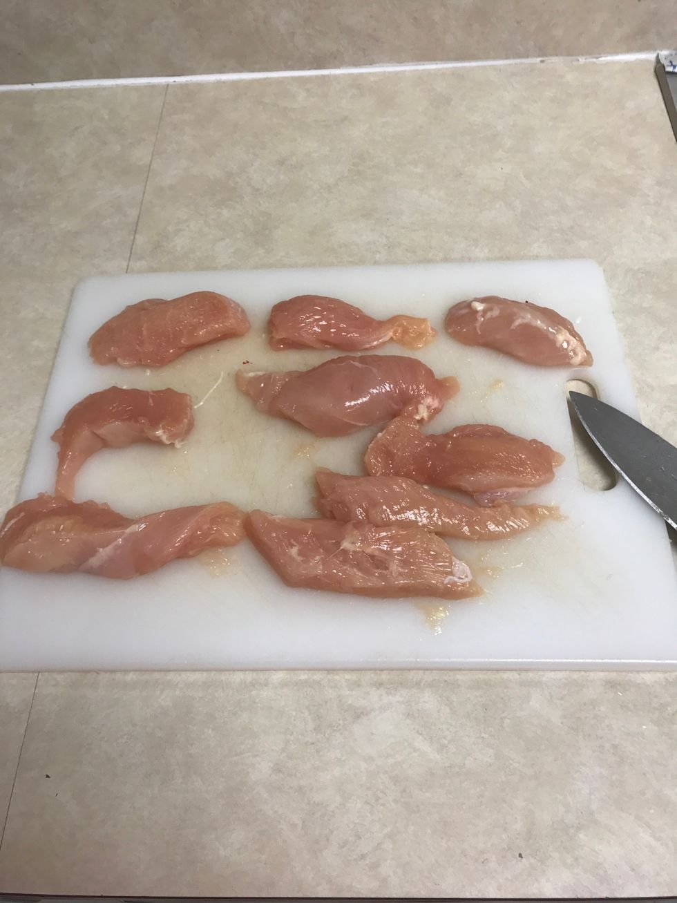Cut chicken breasts into 1/2 inch slices. Boil chicken until fully cooked