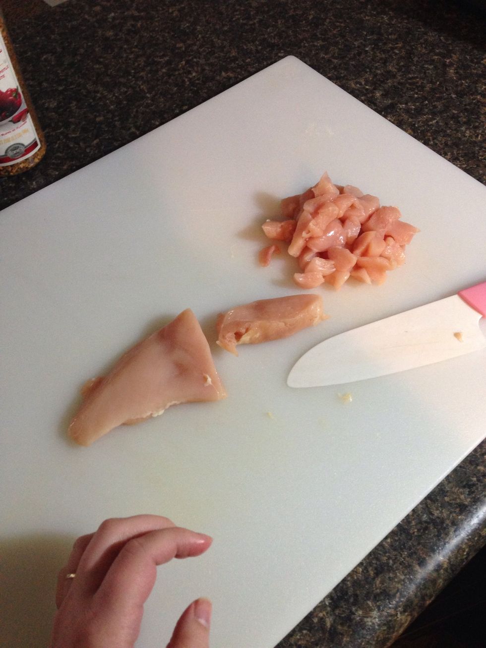 Cut chicken breasts into bite size pieces