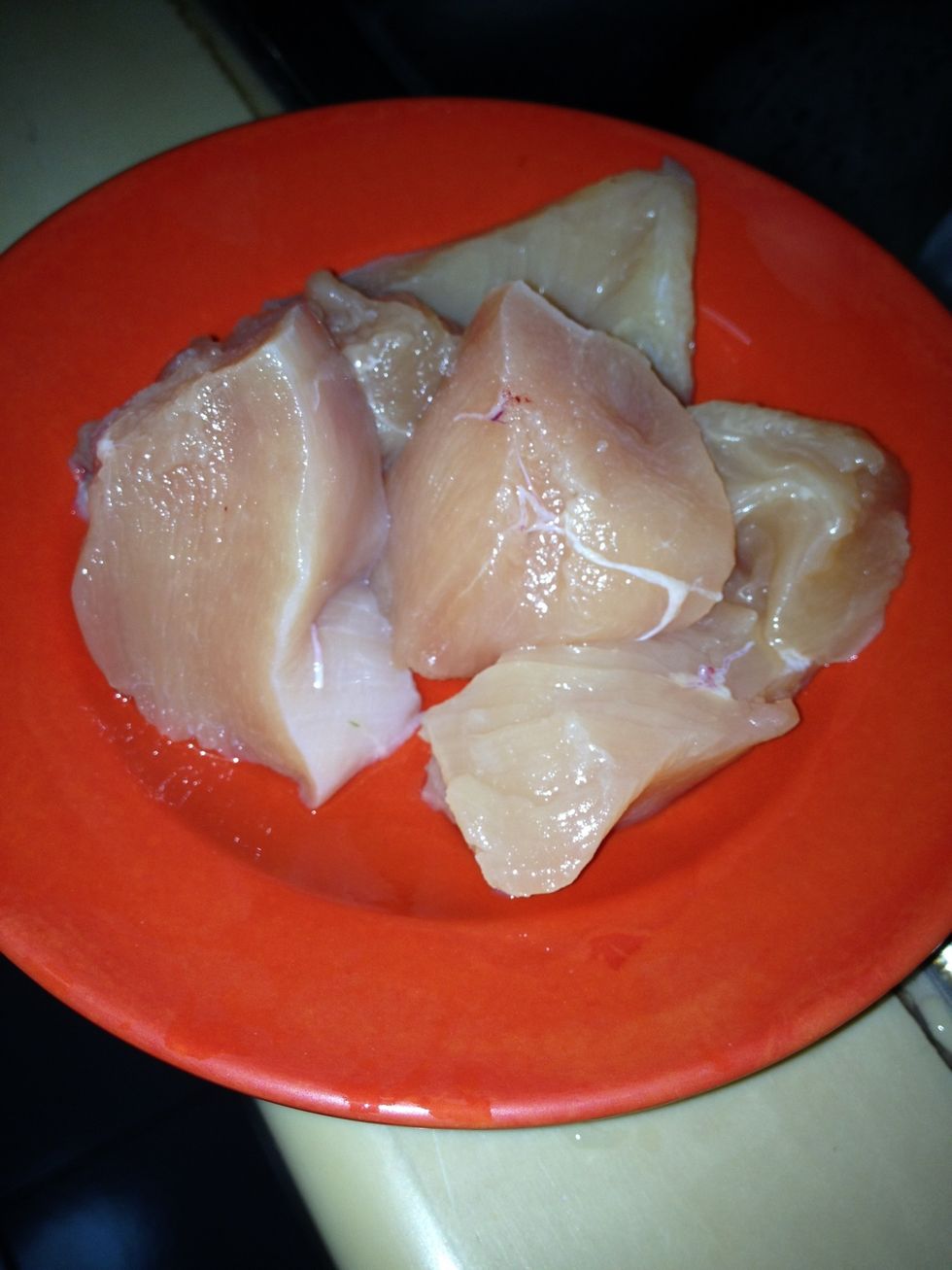 Cut chicken into medium size