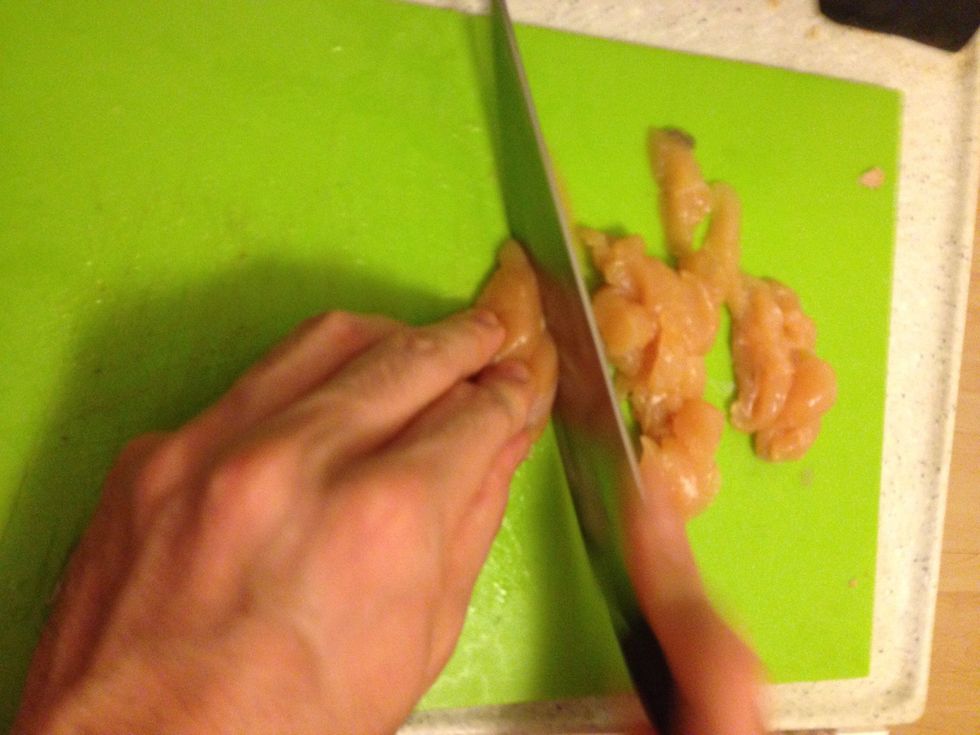 Cut chicken into small pieces, against the grain to keep it tender. Add to soup with mushrooms once herbs have infused.
