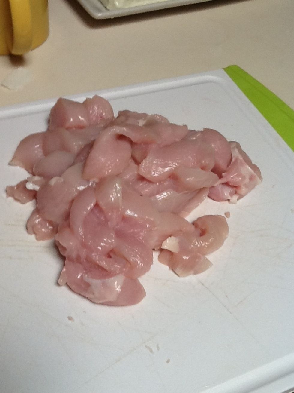 Cut chicken into strips.