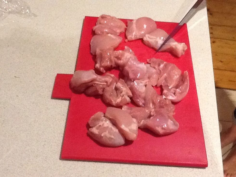 Cut chicken thigh into chunks.