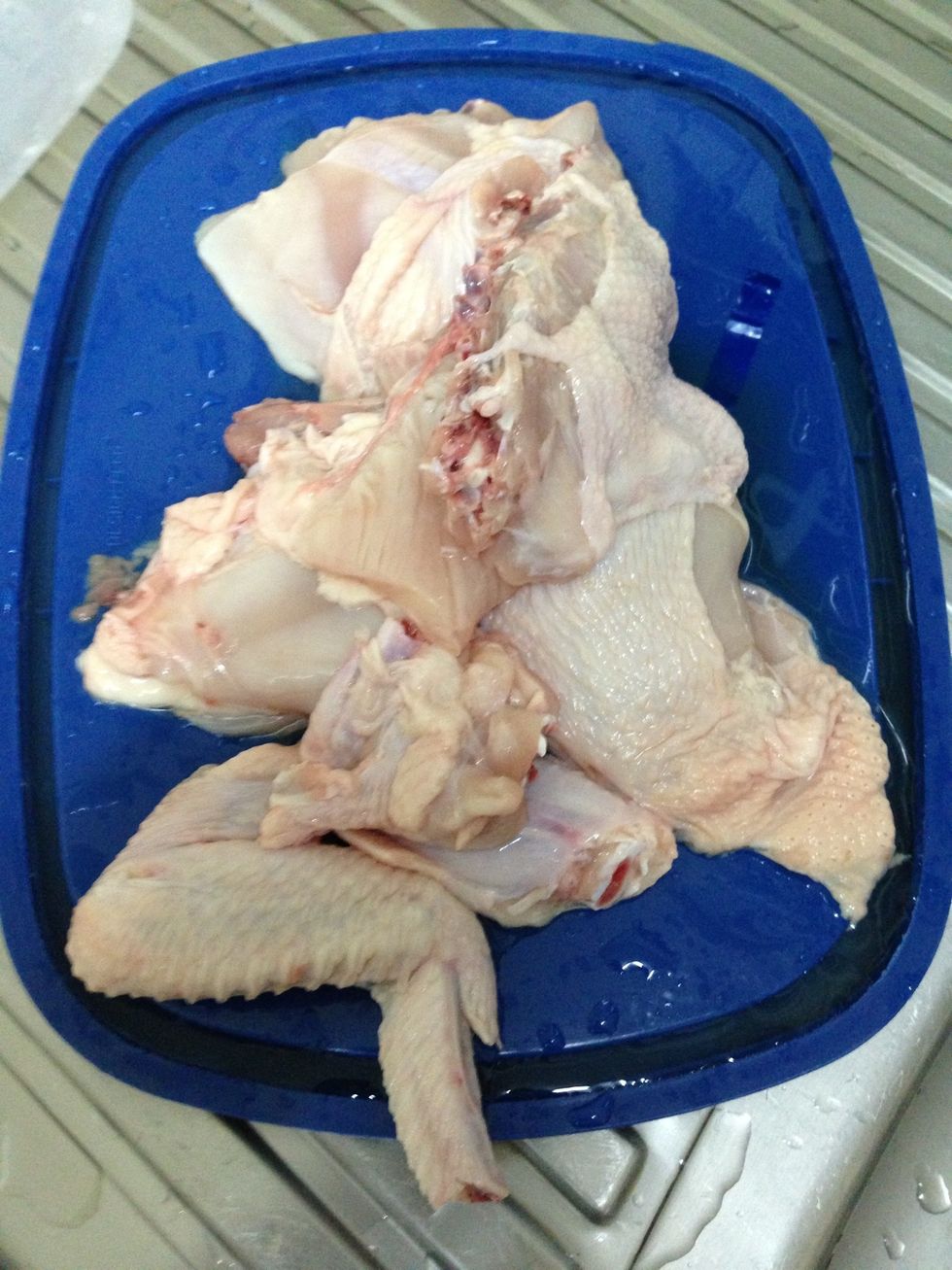 Cut chicken to pieces.