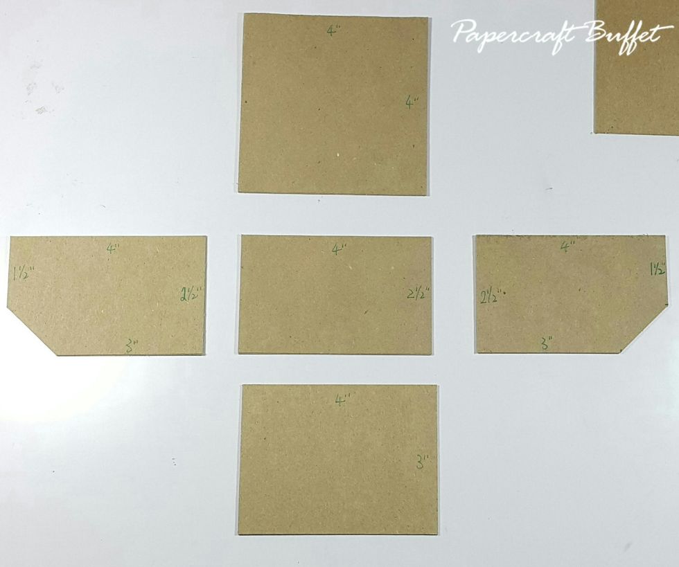 Cut chipboard 1pc 4"x4" (back), 1pc 4"x2-1/2" (base), 1pc 4"x3" (front) and 4"x2-1/2" (sides), chop the corner of the sides pieces in order to fit the box of 1-1/2" and 3" by the sides as shown.