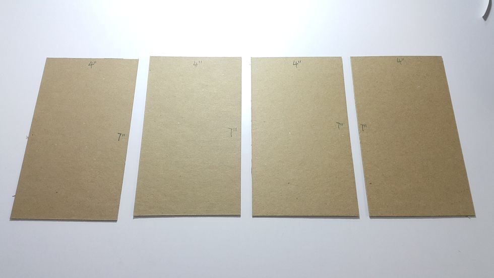 Cut chipboard 4pcs 4"(W)x7"(H), use connecting strips to form into tower shape.