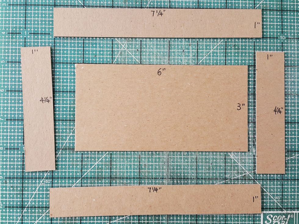 Cut chipboard as shown for the shop roof.
