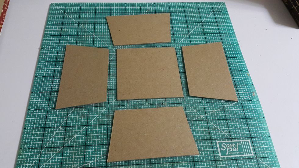 Cut chipboard for the roof, 3-1/2"x3-1/2" (square 1pc) and 4pcs of trapezium shape of 3-1/2" top and 4-1/4" base