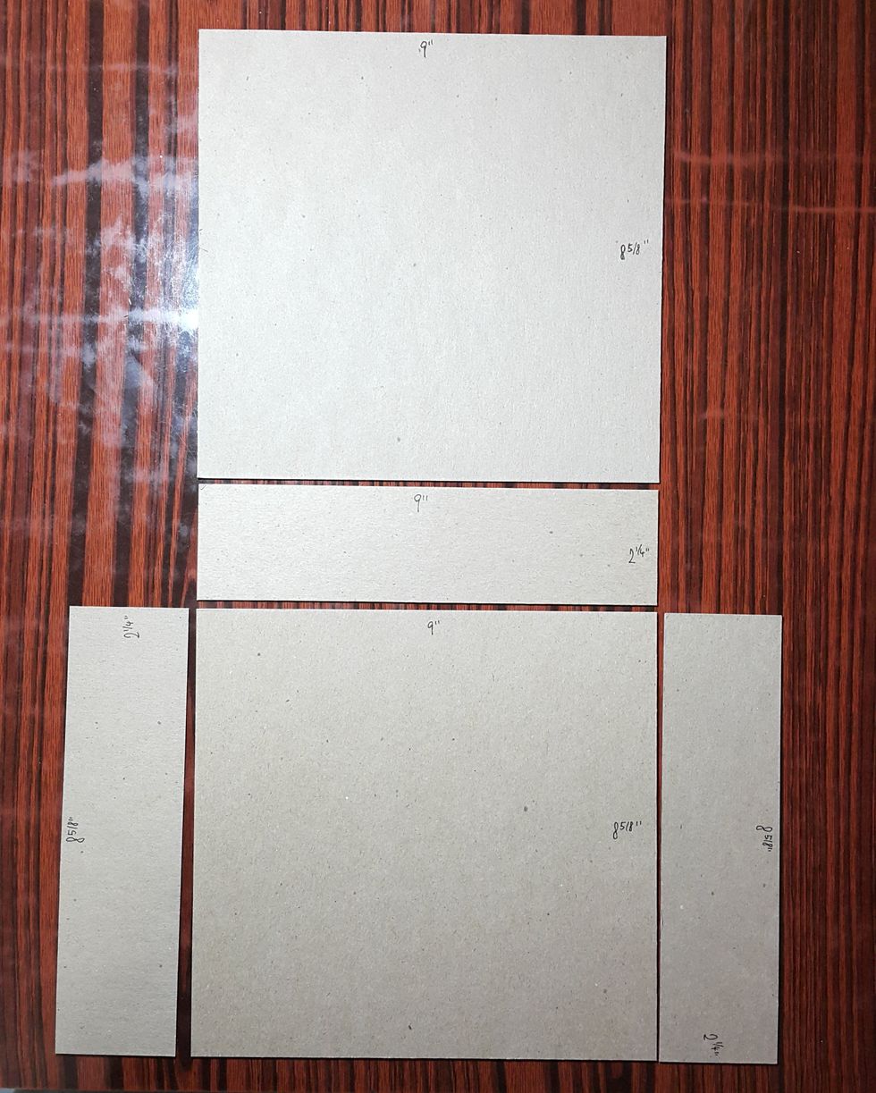 Cut chipboard into size that fit for the Mixed Media Album, with one face open