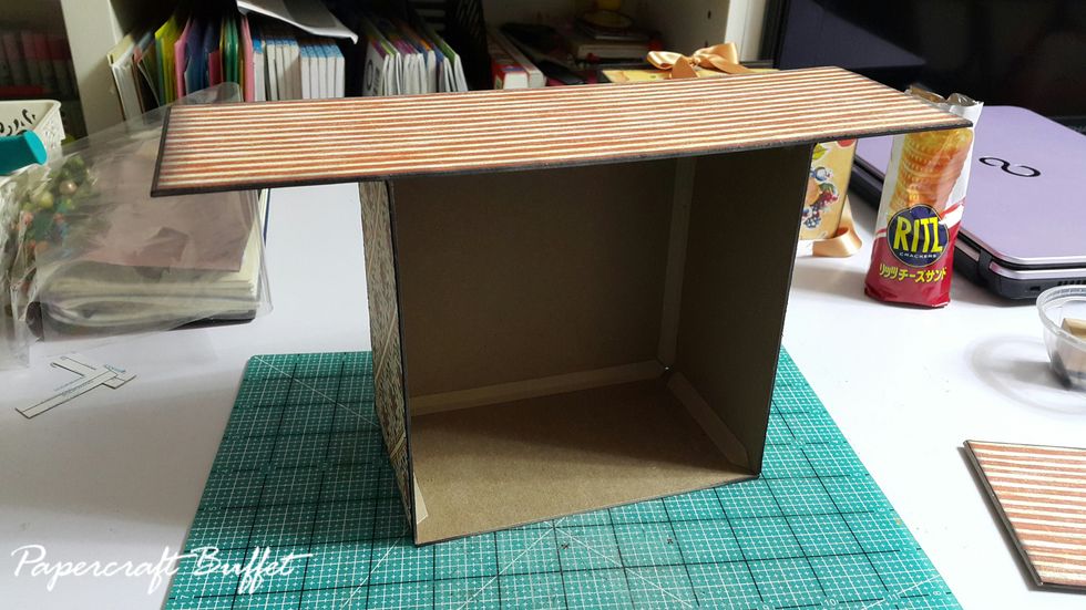 Cut chipboard of 1pc 12"x3-3/4"(top), 1pc 6-1/4"x6-1/4"(back) and 3pcs of 3-1/2"x6-3/4"(sides and bottom), form into shape with connecting strips, then cover with pattern paper.