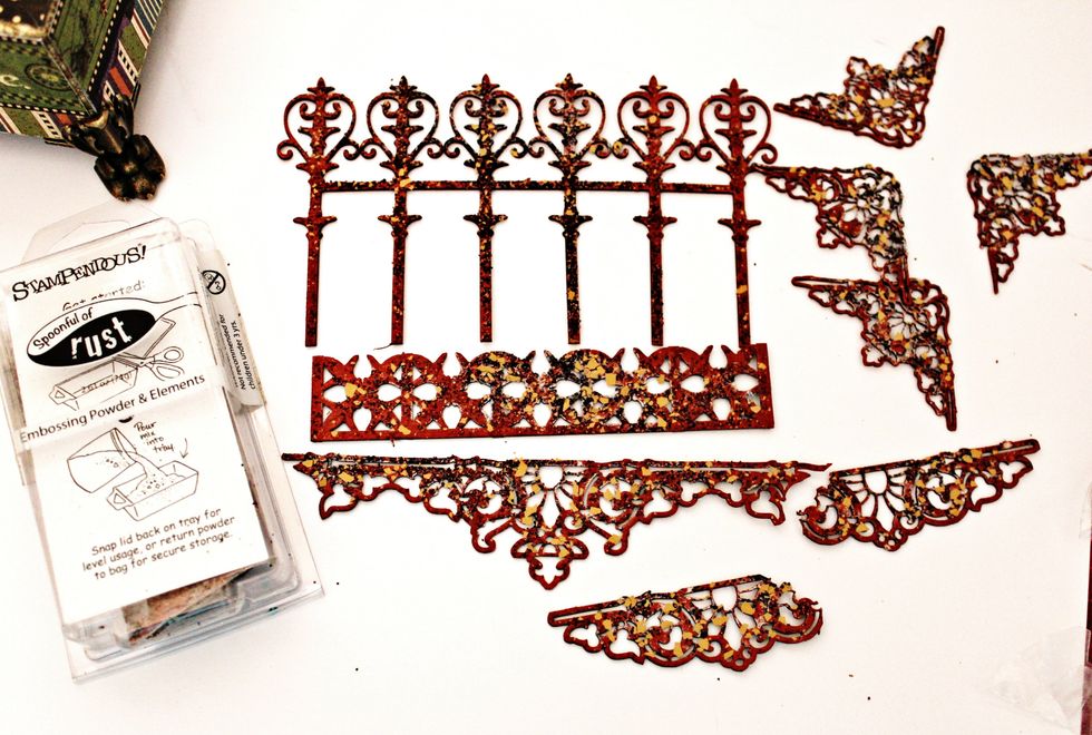 Cut chipboard pieces apart; emboss with rust encrusted embossing powder.
