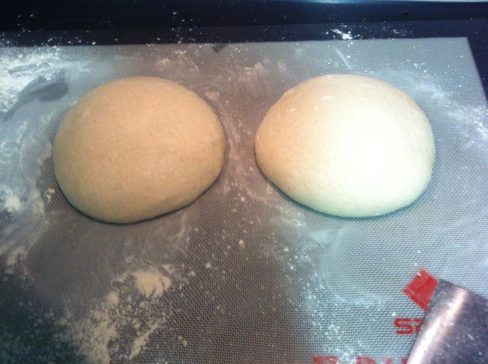 Cut dough in half, flip each half over and shape it into a round
