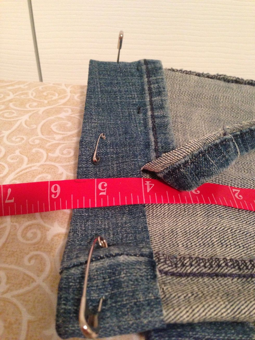 Cut down to 1.25" or 1.5" (go wide for thicker jeans).