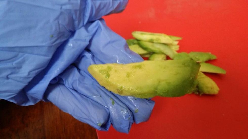 Cut each avocado slice about 1/2 an inch wide and 1 inch long.