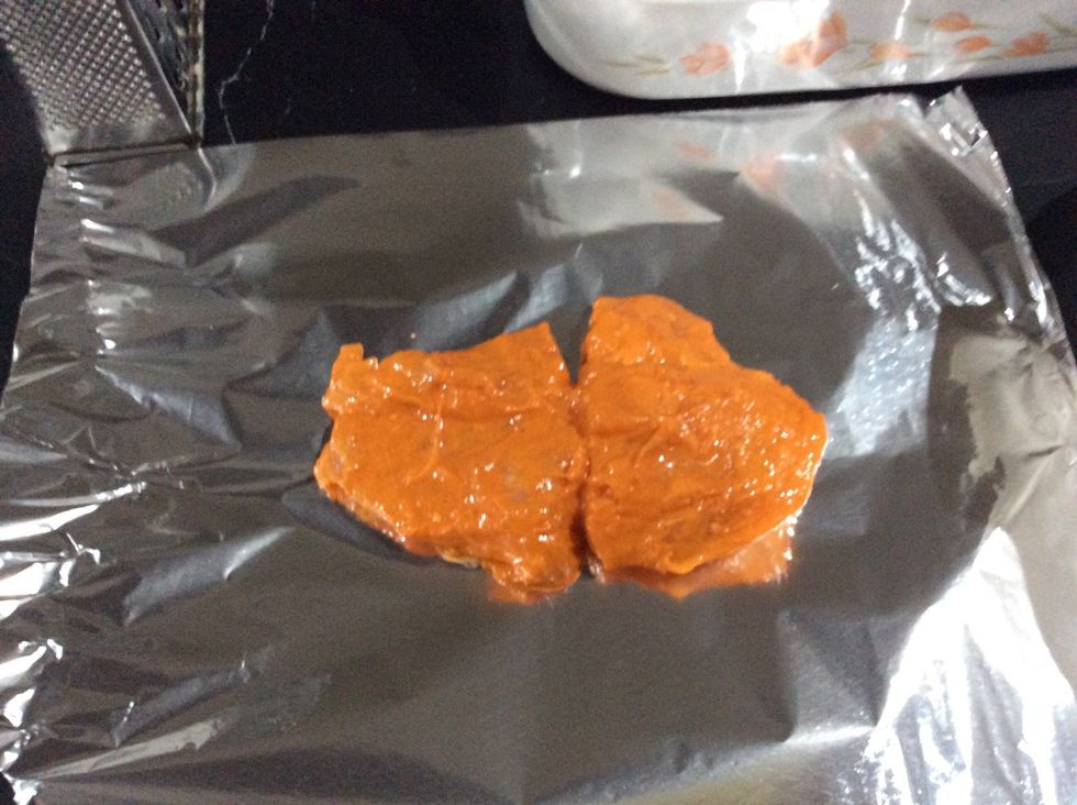 Cut each fillet into halves and wrap in foil