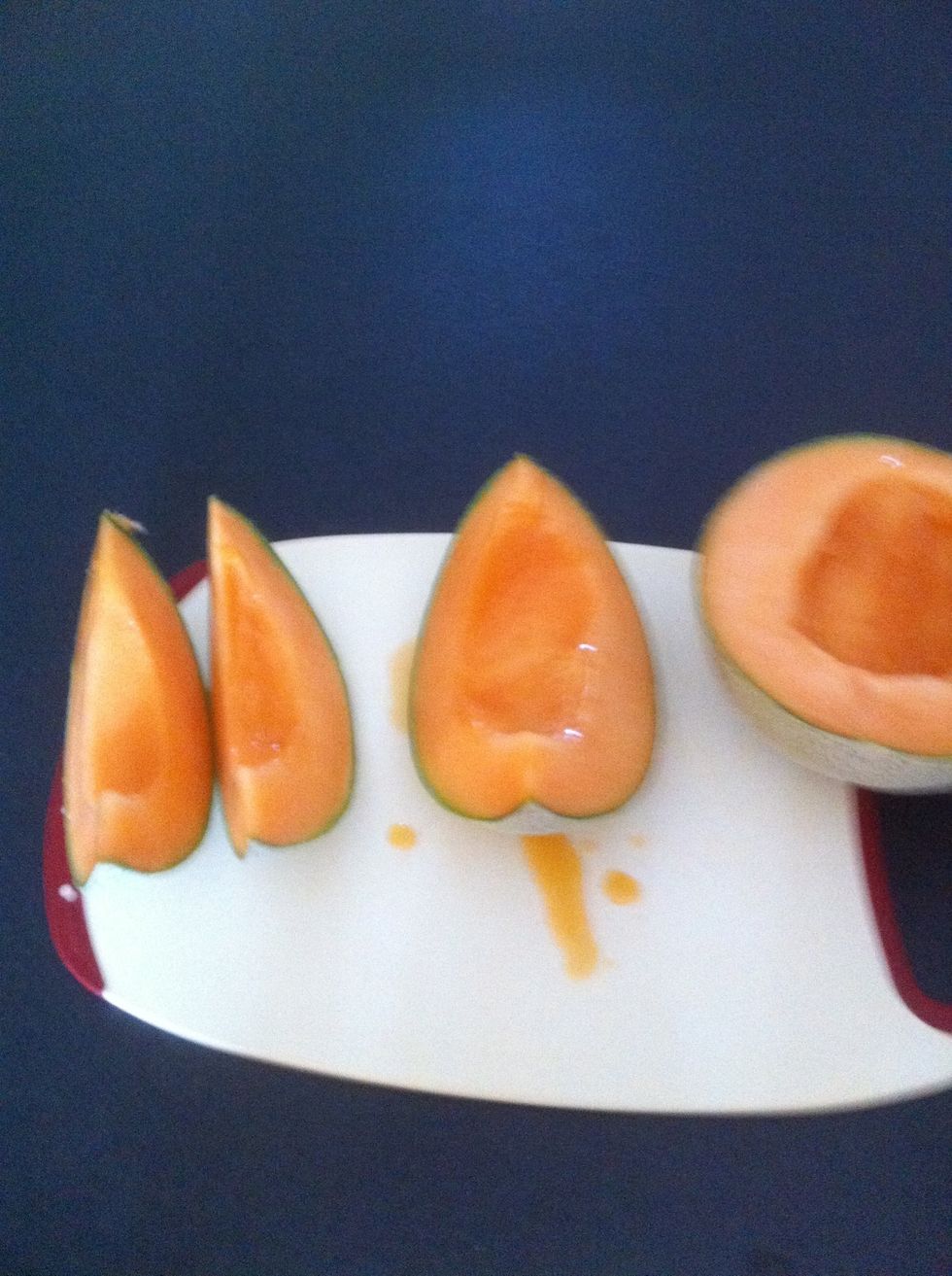 Cut each half into quarters.