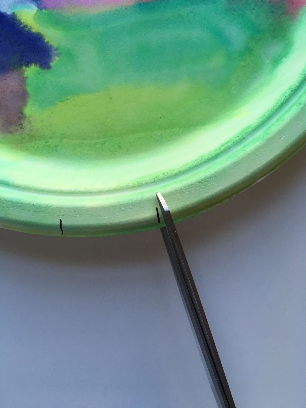 Cut each mark with 2 snips making a V shape.