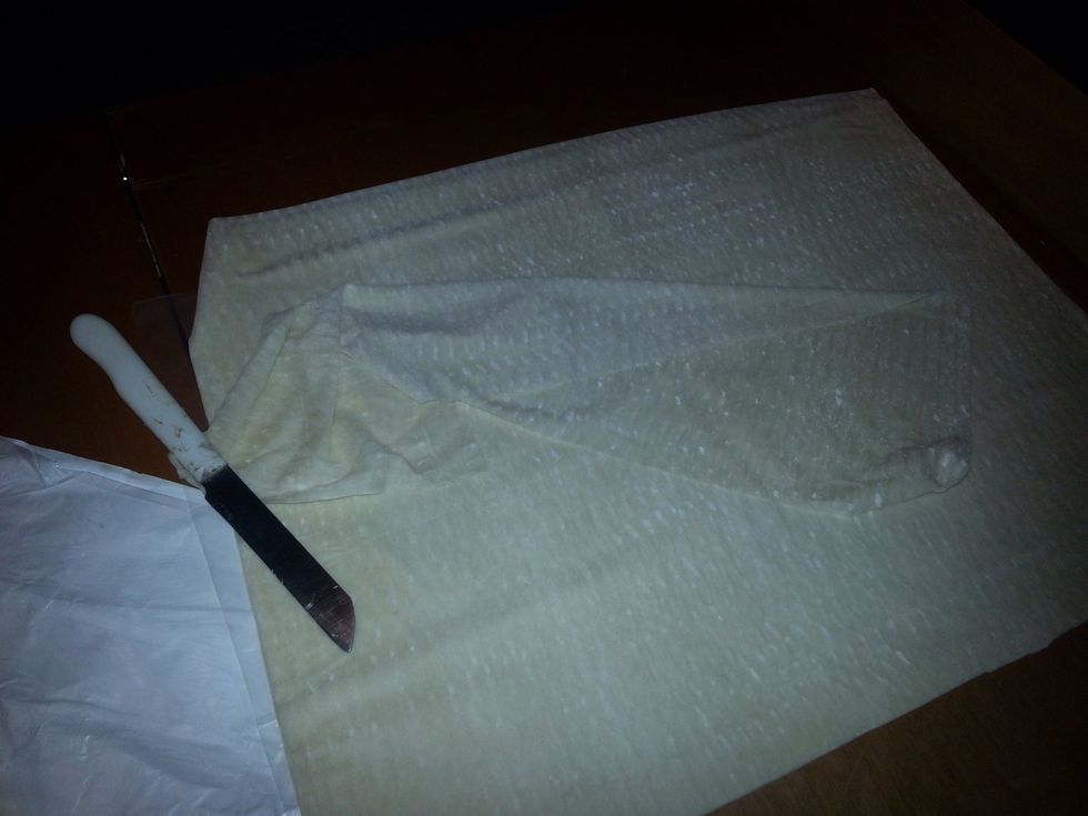 Cut each sheet into three rectangles, so that each slice can generously fit on each strip