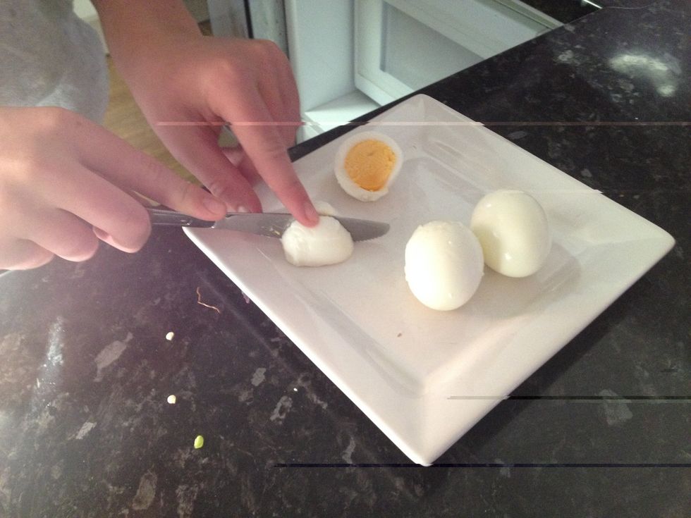 Cut eggs into quarters. Add to bowl.