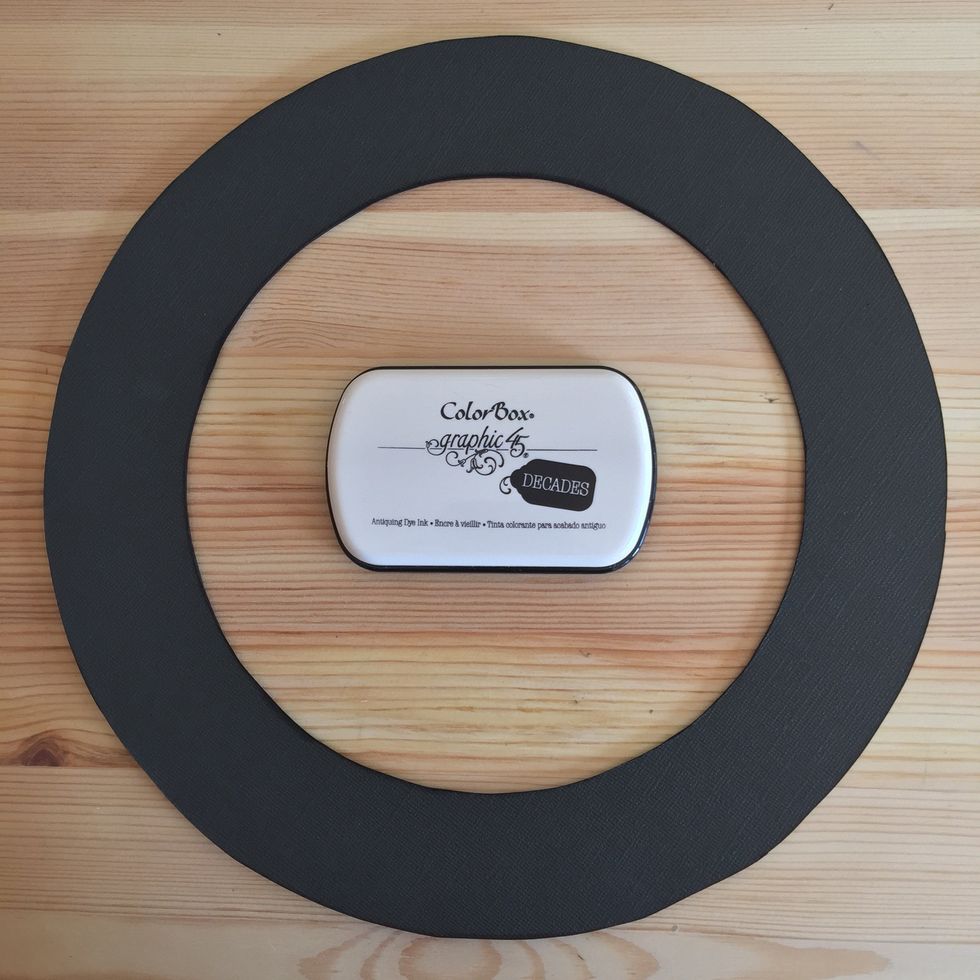 Cut excess of paper when the glue is totally dry, it will be easy to cut. Ink edges.