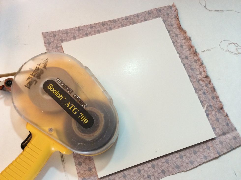 Cut fabric 1" larger than foam core pane.