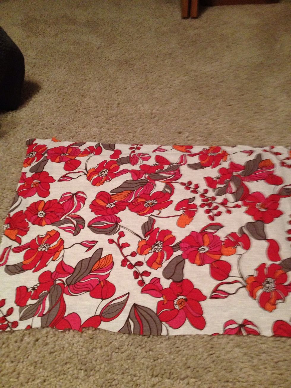 Cut fabric so there is about an inch extra on each side of the bulletin board