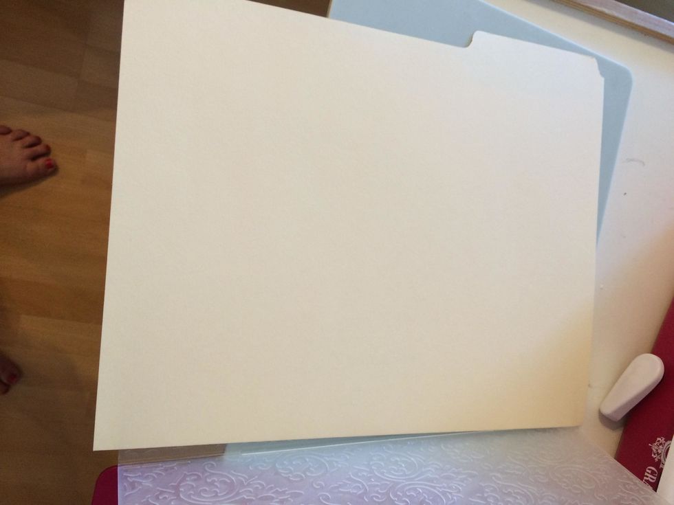 cut file folder in half and emboss