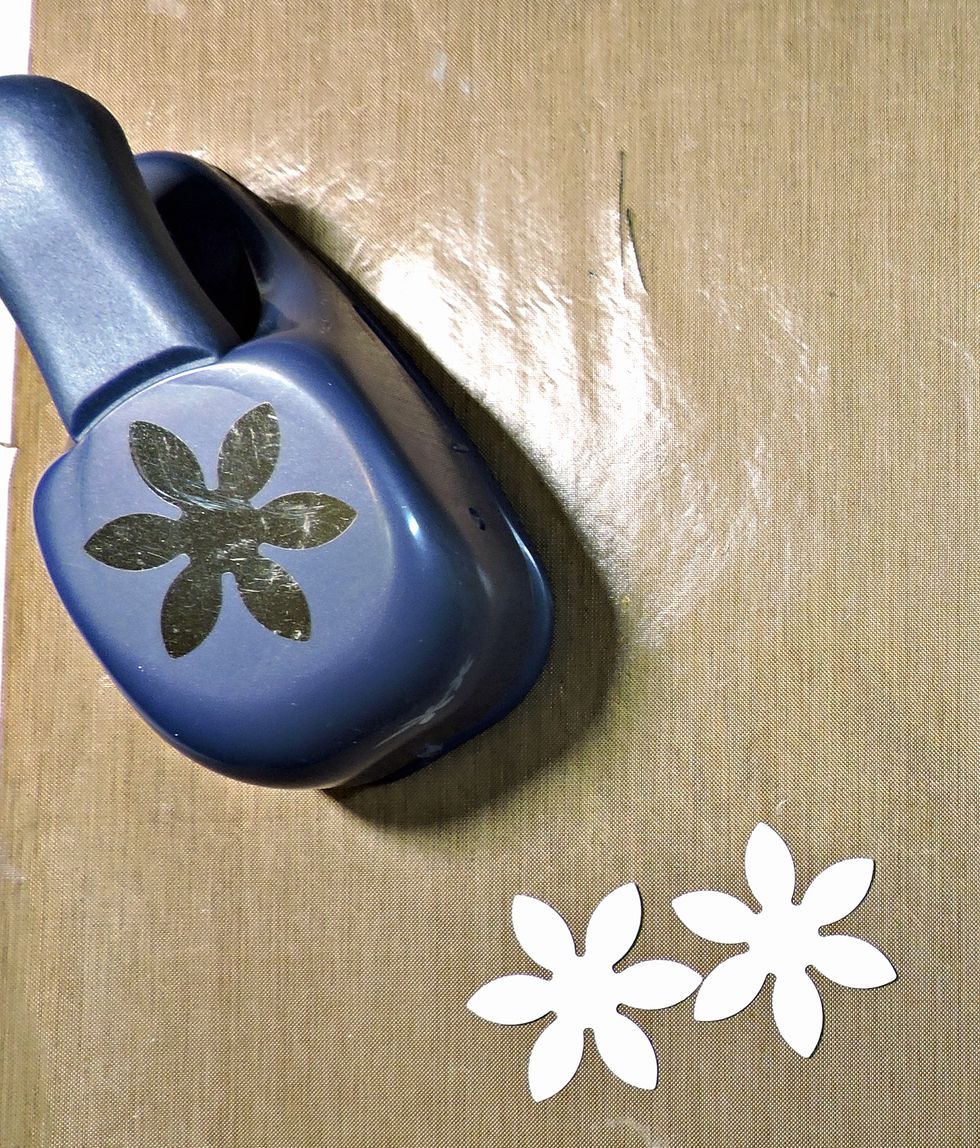 Cut flower shapes, using punch, die and/or cutting machine.