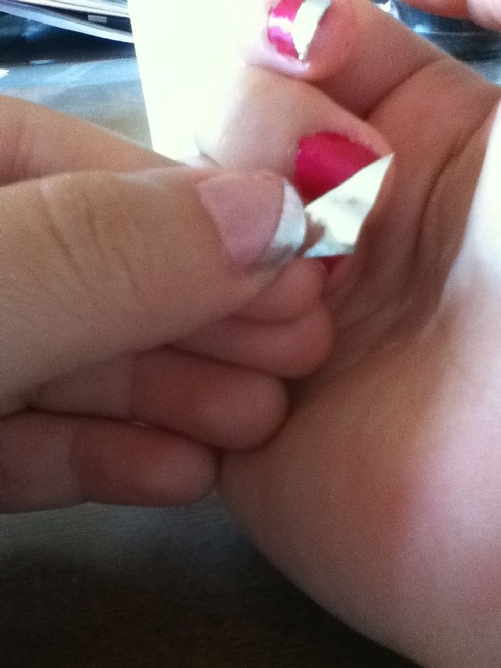 Cut foil into small triangles so that it's easier to shape it to your nails.