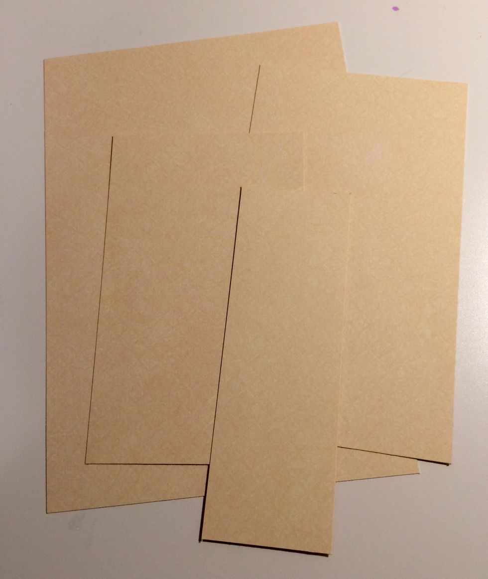 Cut four pieces from the 12x12 Patterns & Solids - St.Nicholas that measure: 4 1/2" x 6 1/2", 3 1/2" x 5 1/4" & 2 1/4" x 4 1/2".