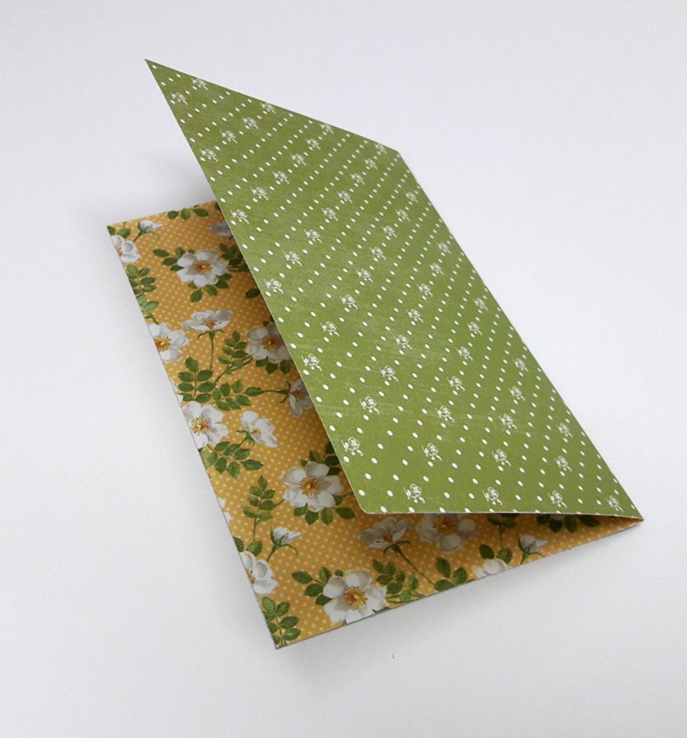 Cut four squares 7 6/8" x 5 7/8" and fold in half.