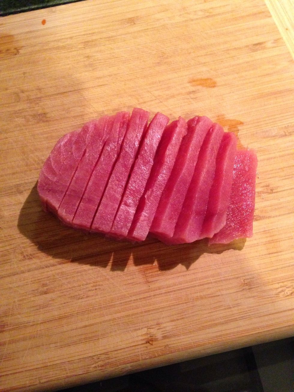 Cut fresh tuna in half inch size