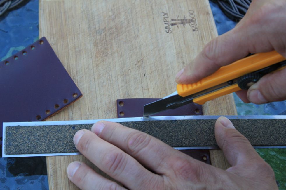 Cut grip to size:  Lay the grip flat on a cutting surface and measure the desired length. Make a mark on both sides, closest to the measurement that places the cut line... (next slide)