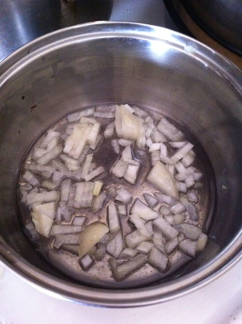 Cut half an onion and put it in a pan with little bit of oil