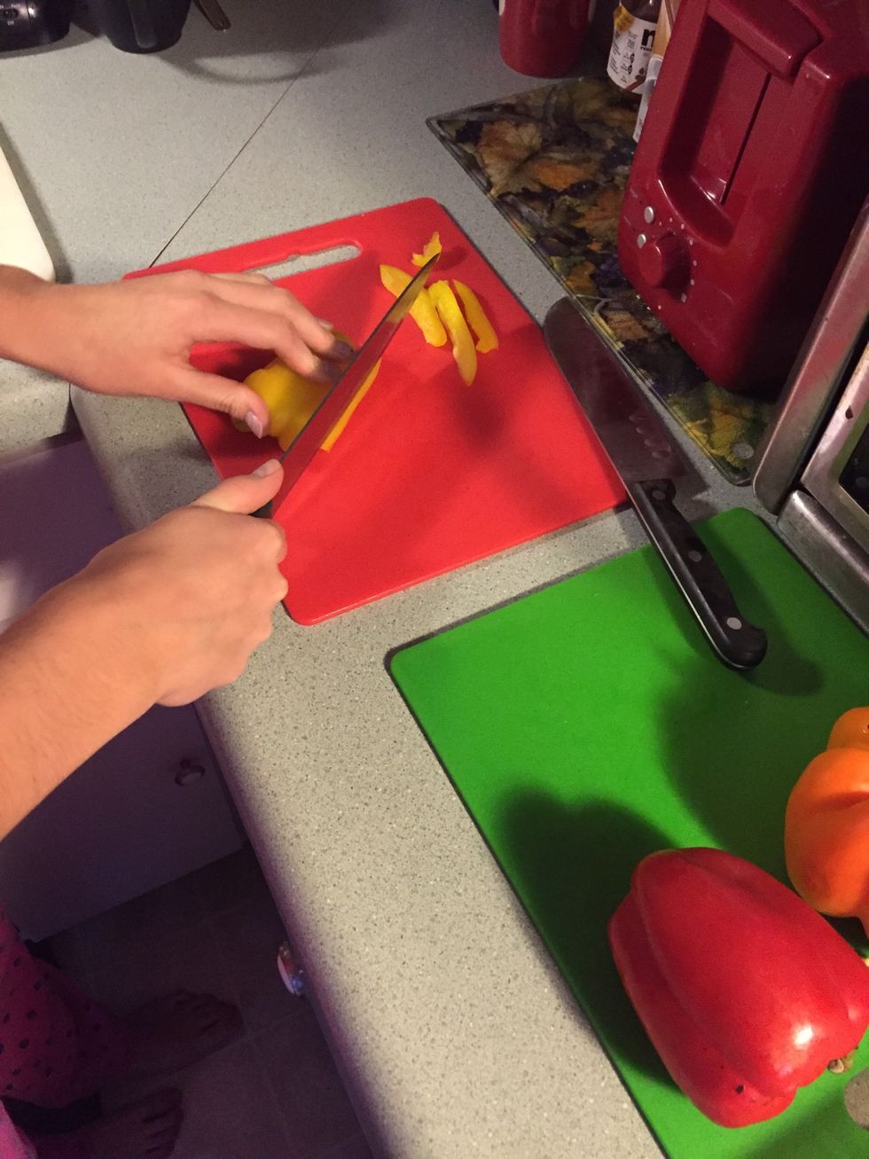 Cut half of each pepper up