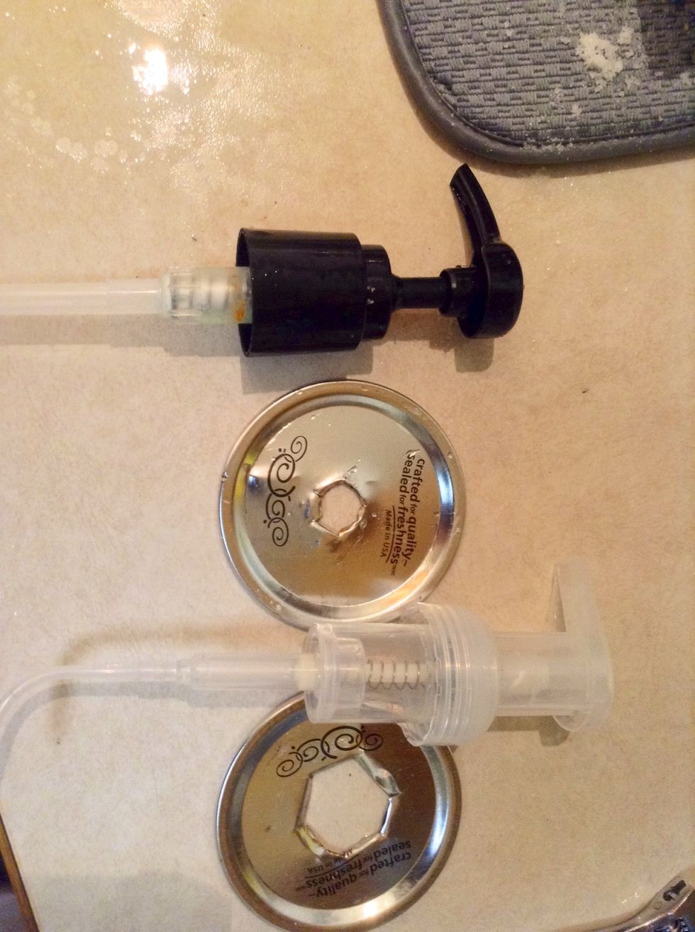Cut holes big enough for pumps on lids. I used a box cutter. You need a bigger hole for the pump soap dispenser.