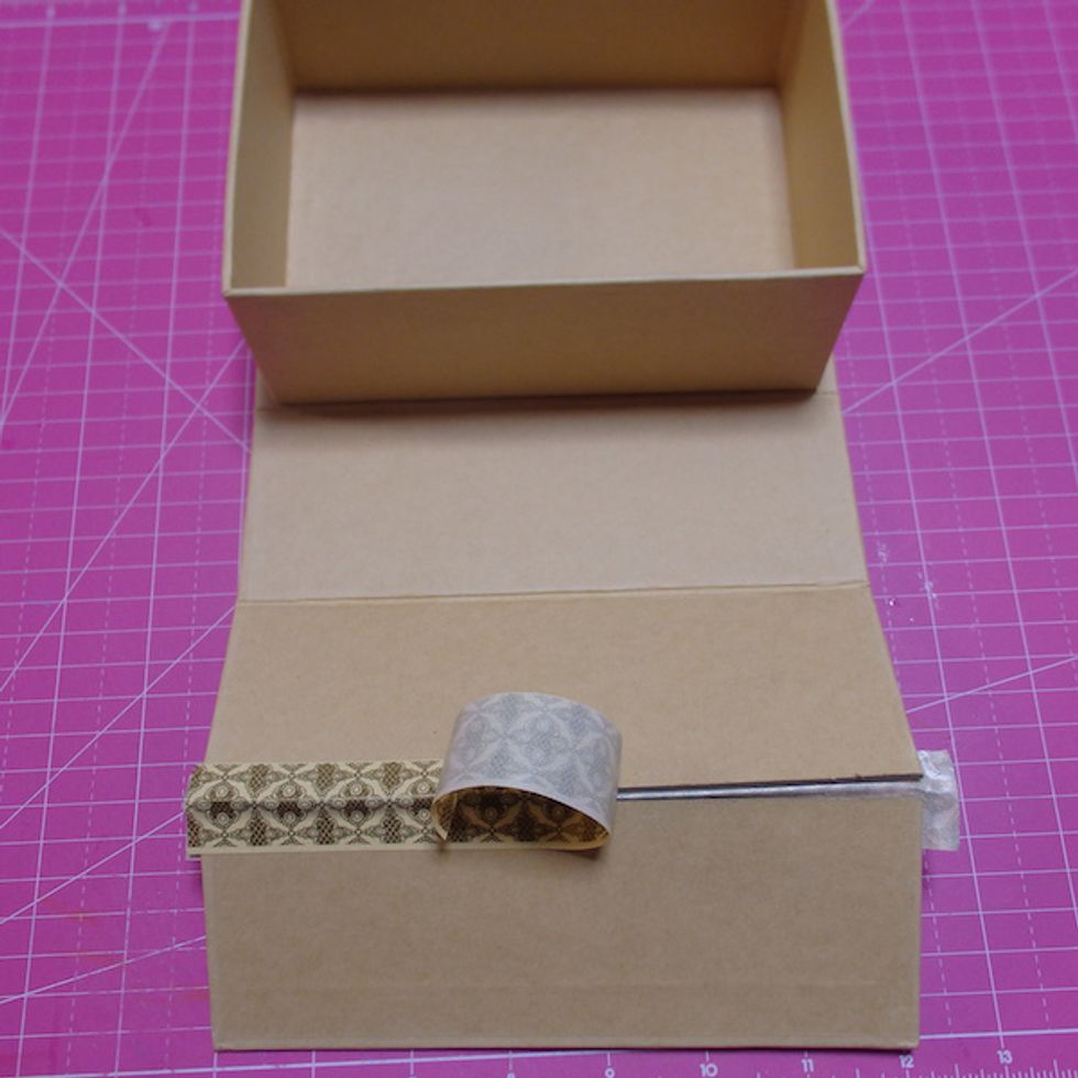 Cut horizontal half of lid and tape