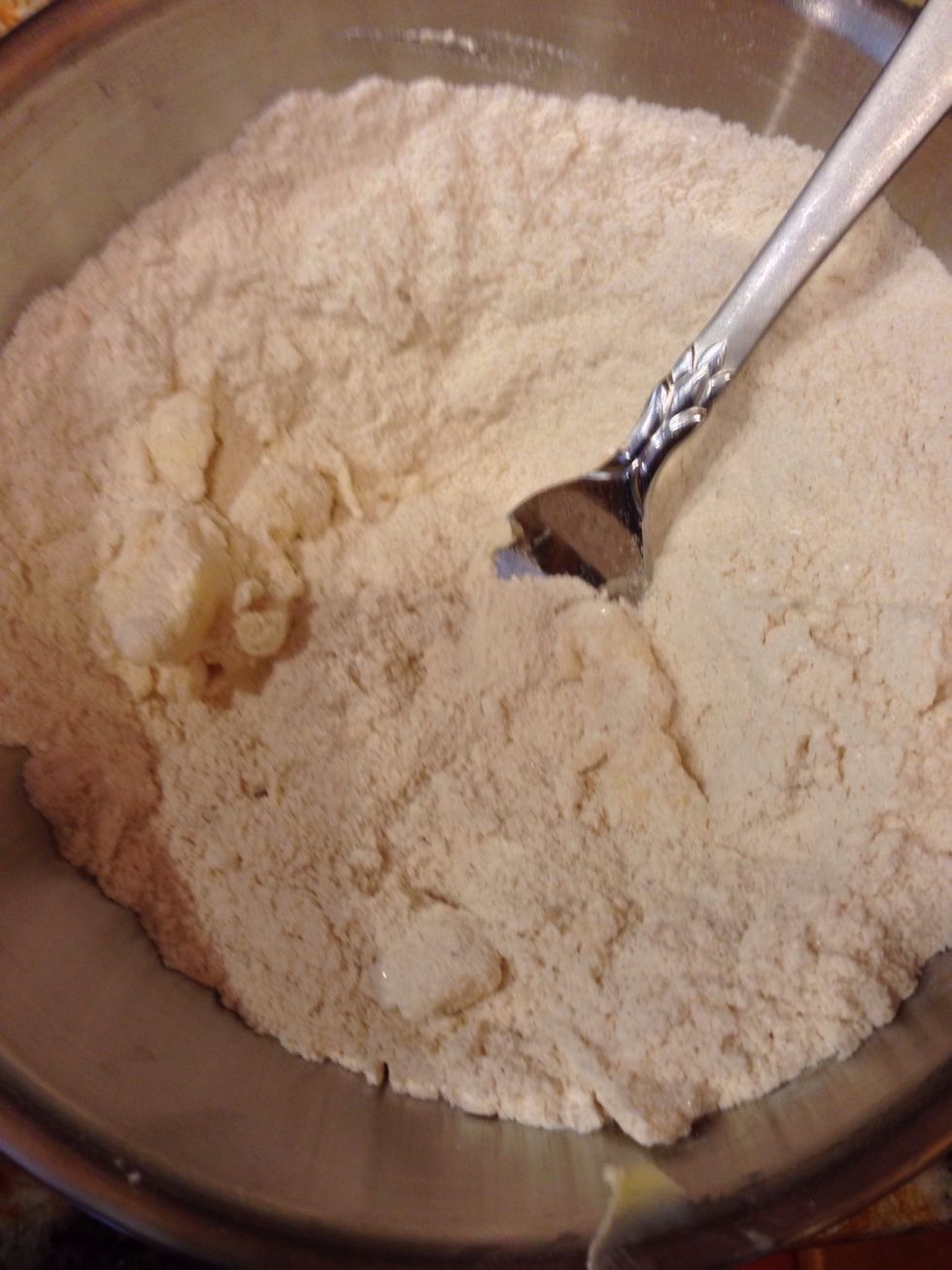 Cut in 4 tbsp of butter to your flour mixture.