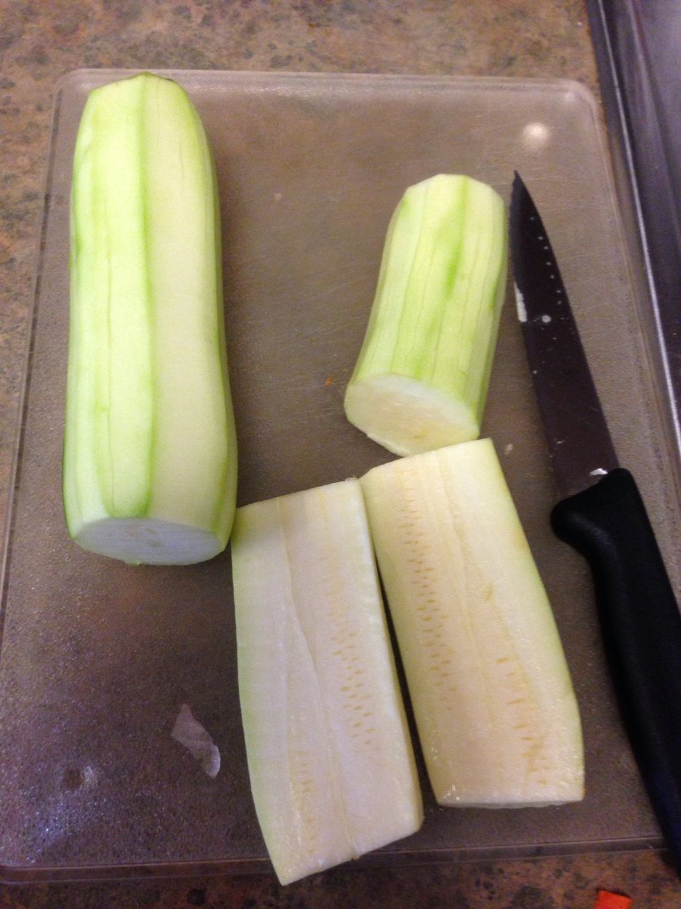 Cut in half and then in half lengthwise and put into soup